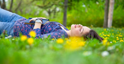 stock-photo-portrait-of-cute-young-teenage-girl-relaxing-in-spring-park-100006208